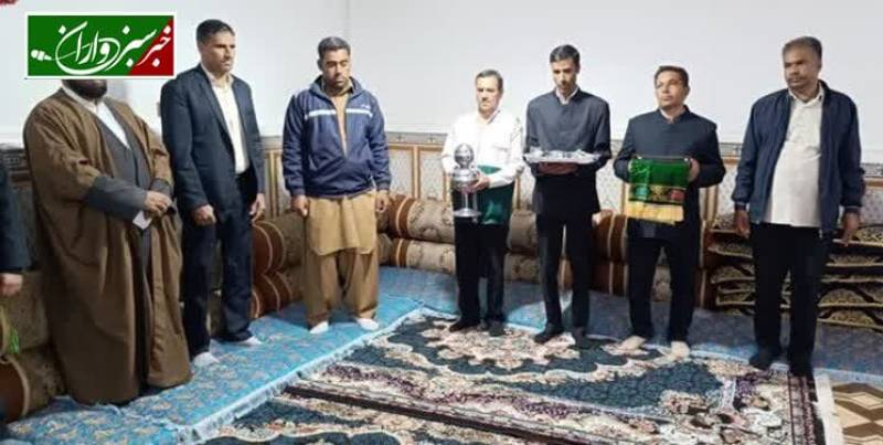 تجلیل خادمیاران رضوی از خانواده شهدای نعمت‌آباد ریگان